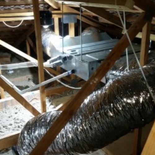 Typical in ceiling ducted AC install, showing flexible ducting, pipework and drain
